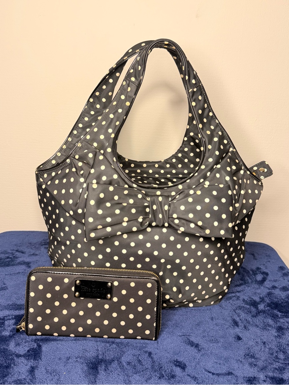 Kate Spade New York polka dot nylon tote bag with a front bow detail